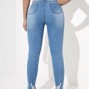 Light blue ripped jeans